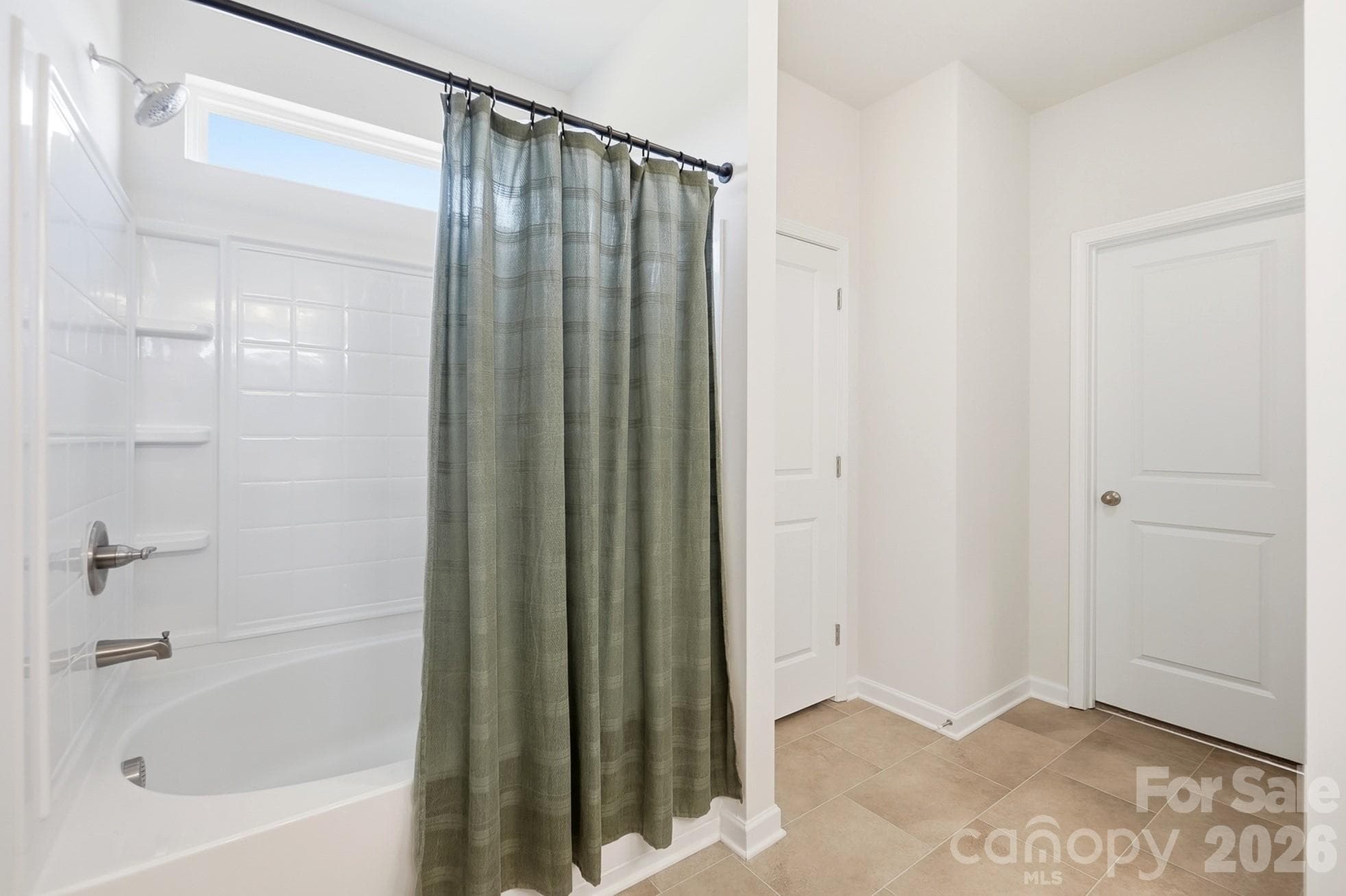 Primary bath includes a garden tub with shower. - 6023 Busch Way, Midland