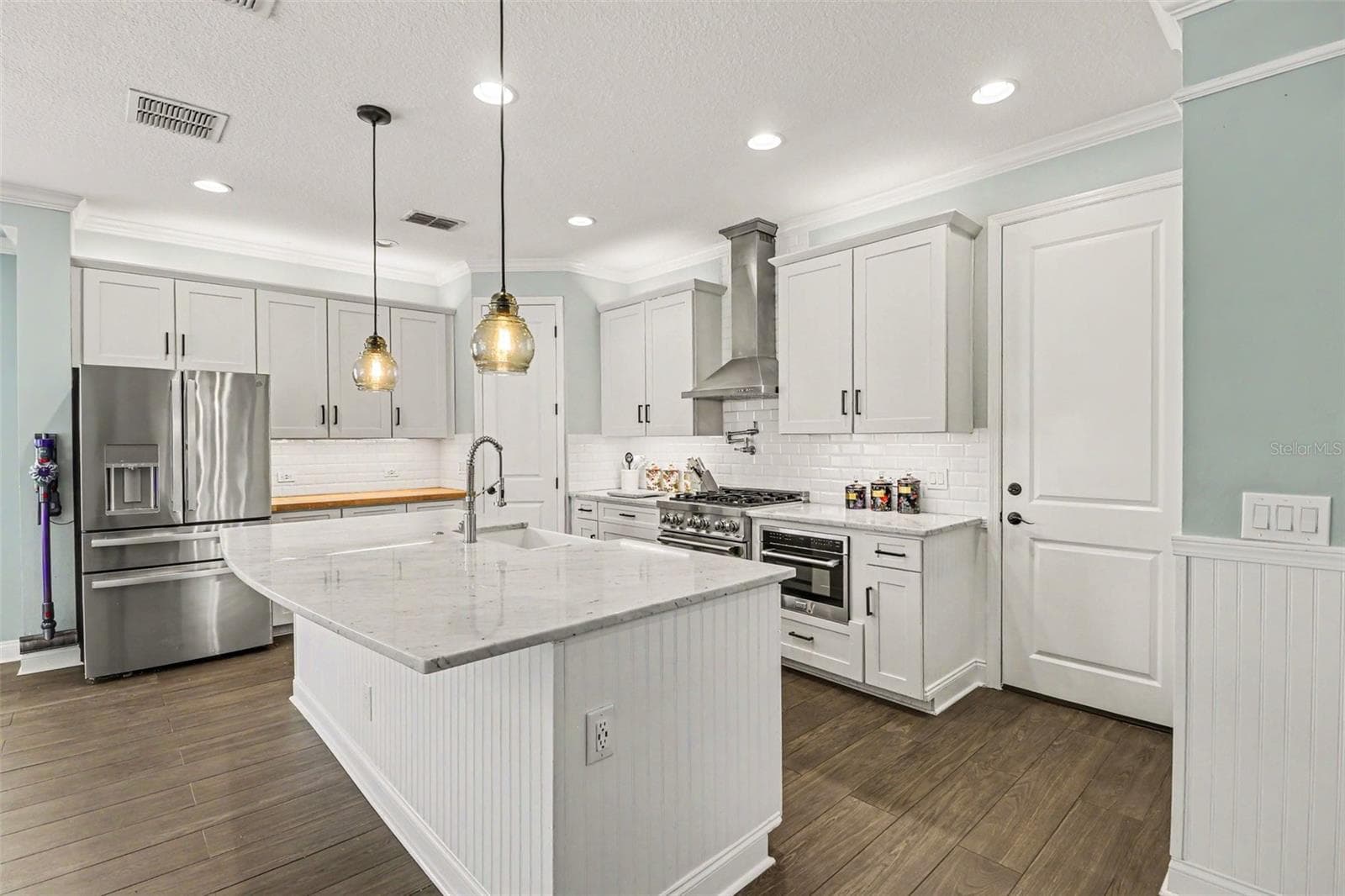 Kitchen with Carerra Marble Countertops - 10651 LANGEFIELD ST, ORLANDO