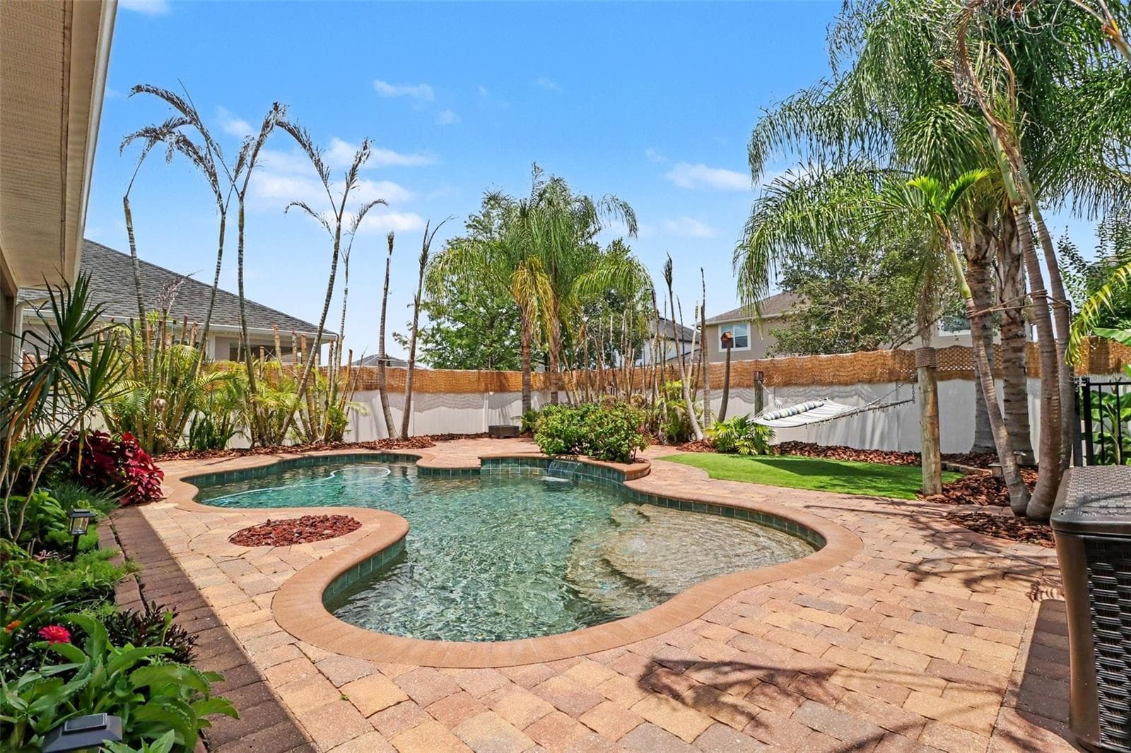 Pebbleteck Freeform Pool with Pavers - 10651 LANGEFIELD ST, ORLANDO