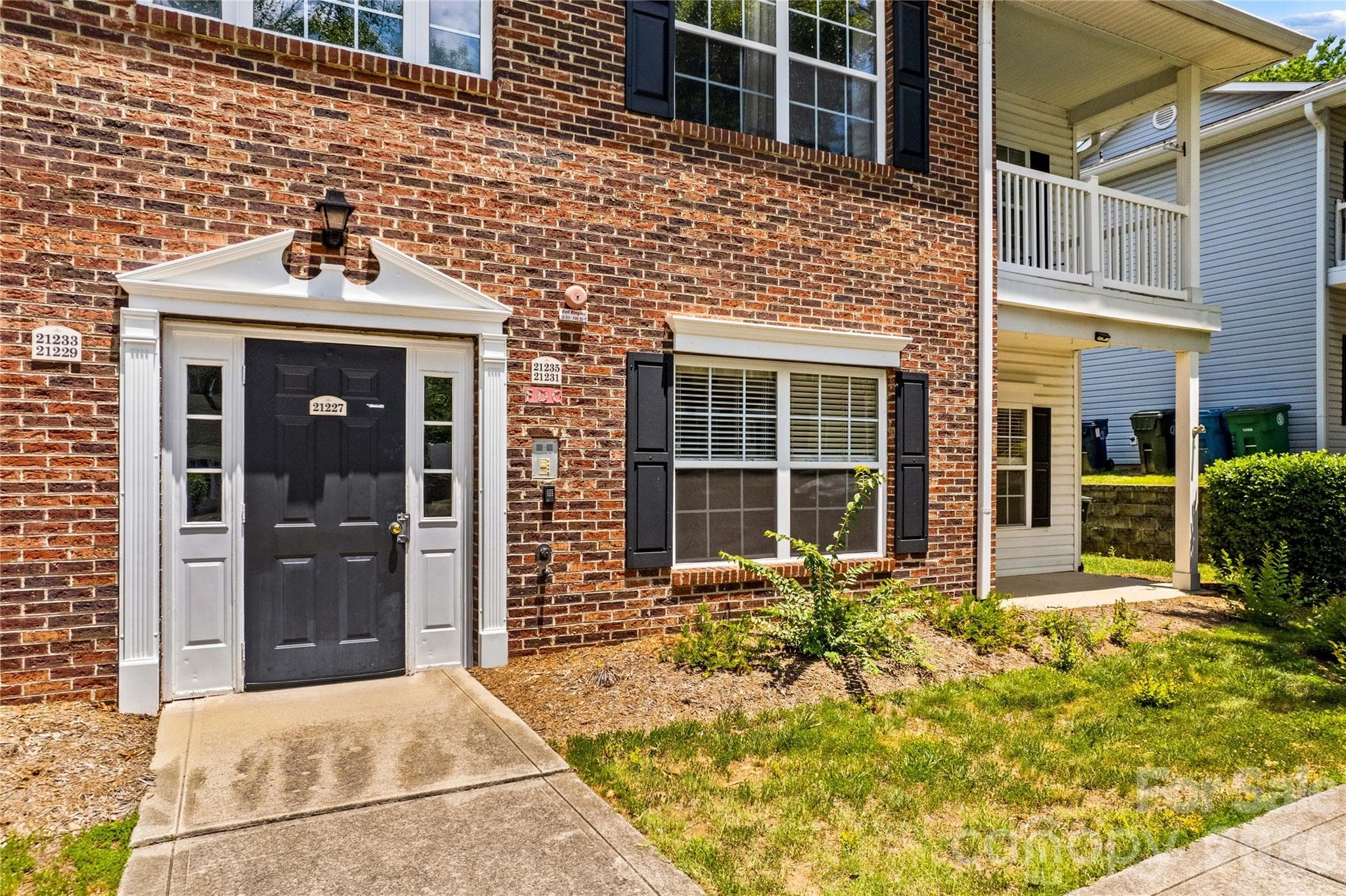 Main floor condo with covered porch. - Cornelius