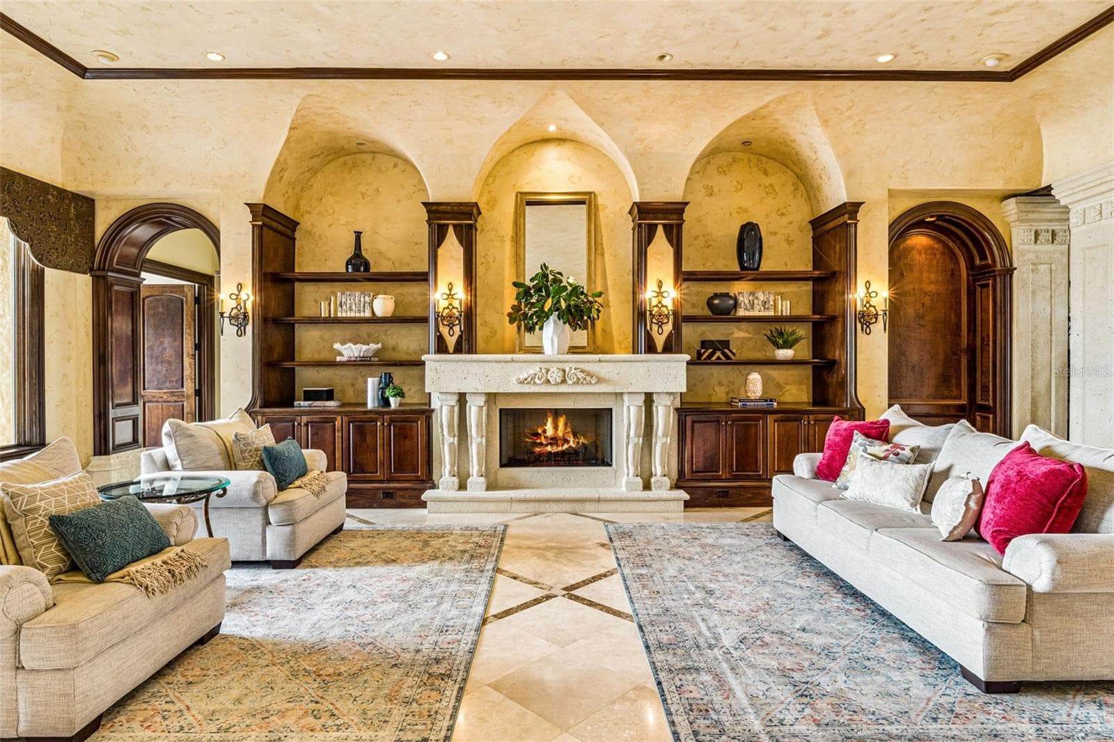 Formal Living Room with handcrafted Venetian Archways - 16619 AREZO CT, MONTVERDE