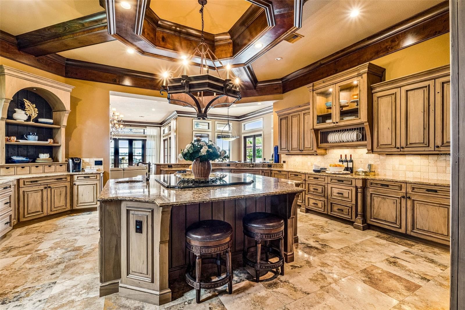 Kitchen with a grand island perfect for hosting & entertaining! - 16619 AREZO CT, MONTVERDE