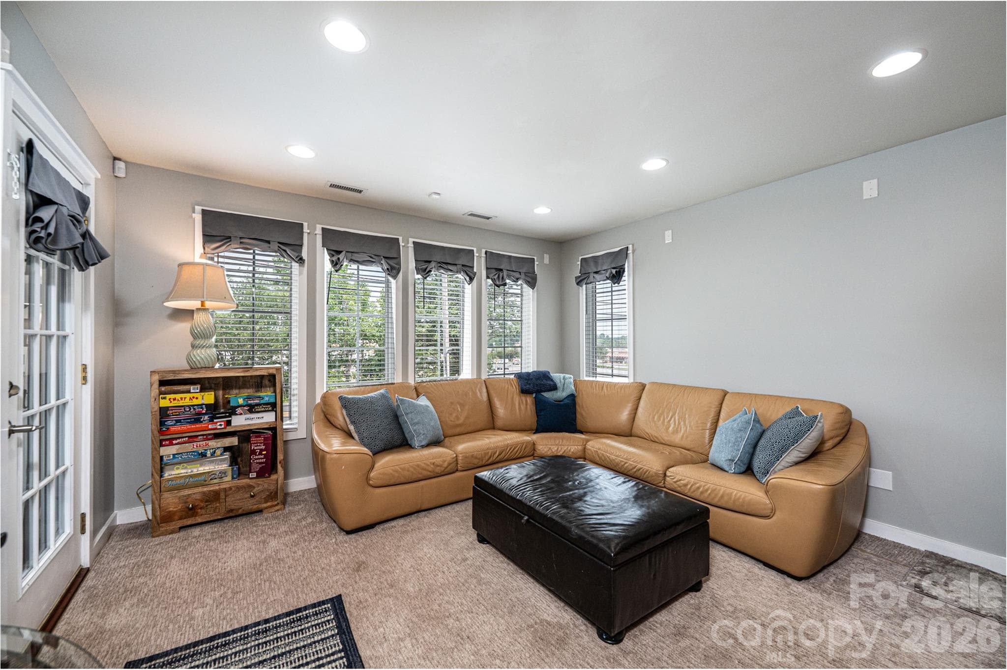 Living room-lots of natural light, window treatments - Statesville
