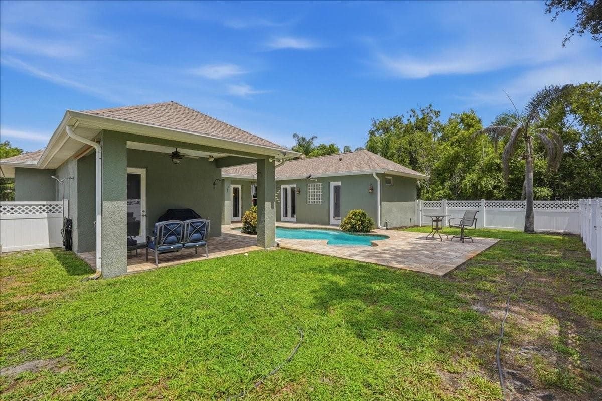 Pool area enclosed with vinyl fencing. Dog run - 7014 JONES RD, ODESSA