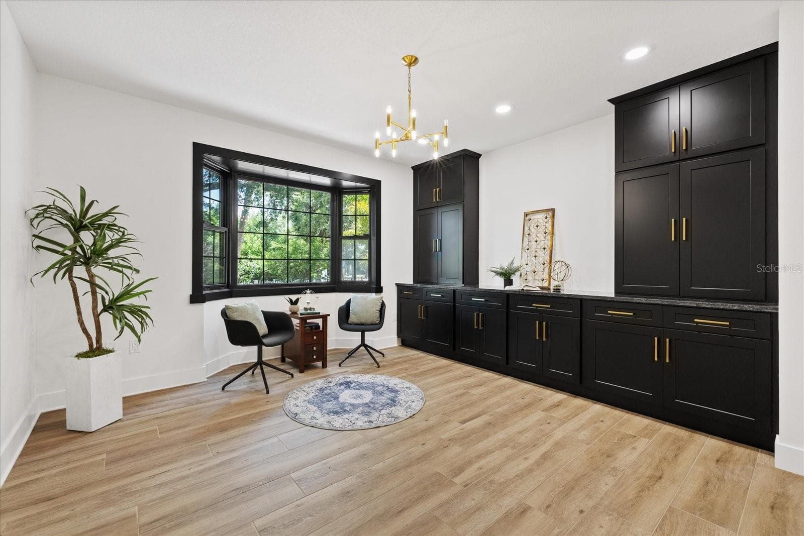 Built-in storage for office or bonus room. - 5623 HULL CT, NEW PORT RICHEY