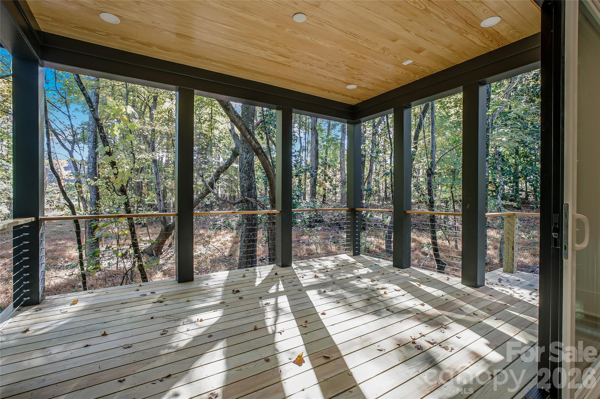 Representative photo of a completed home with the same floorplan. Photos do not reflect the exact finishes. 4003 Sage Cliff will have a screened porch with stamped concrete and gas fireplace. - 4003 Sage Cliff Court, Matthews