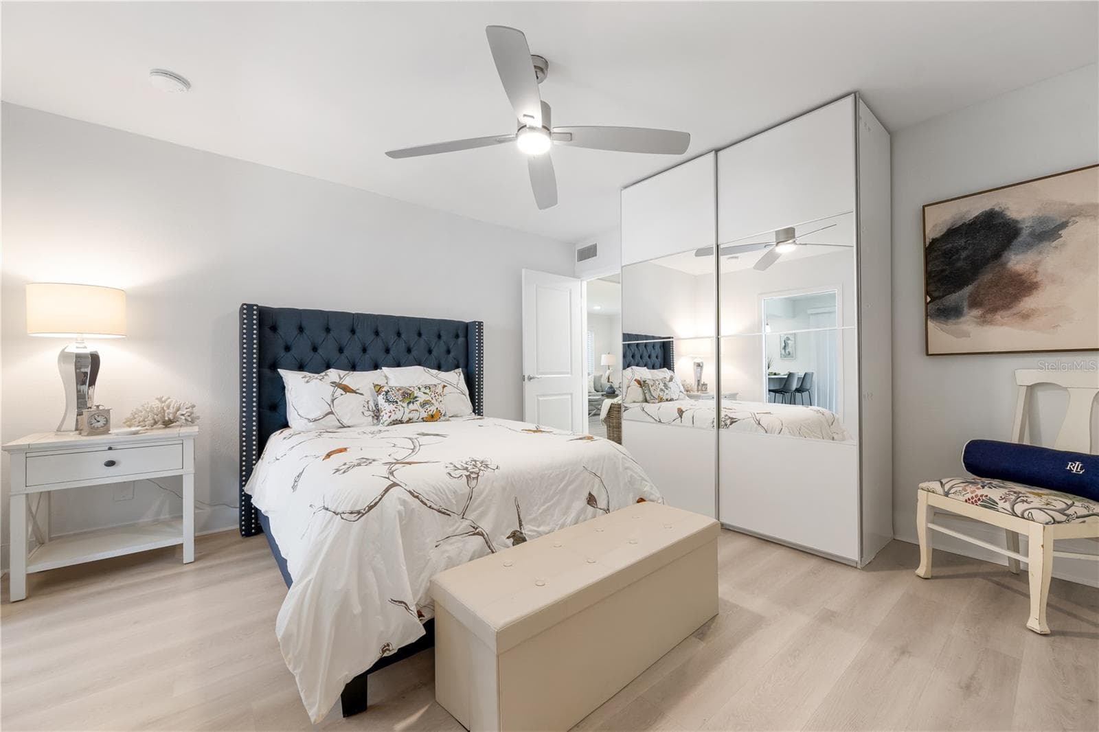mirrored cabinet in primary bedroom - 524 SPANISH DR S #125, LONGBOAT KEY