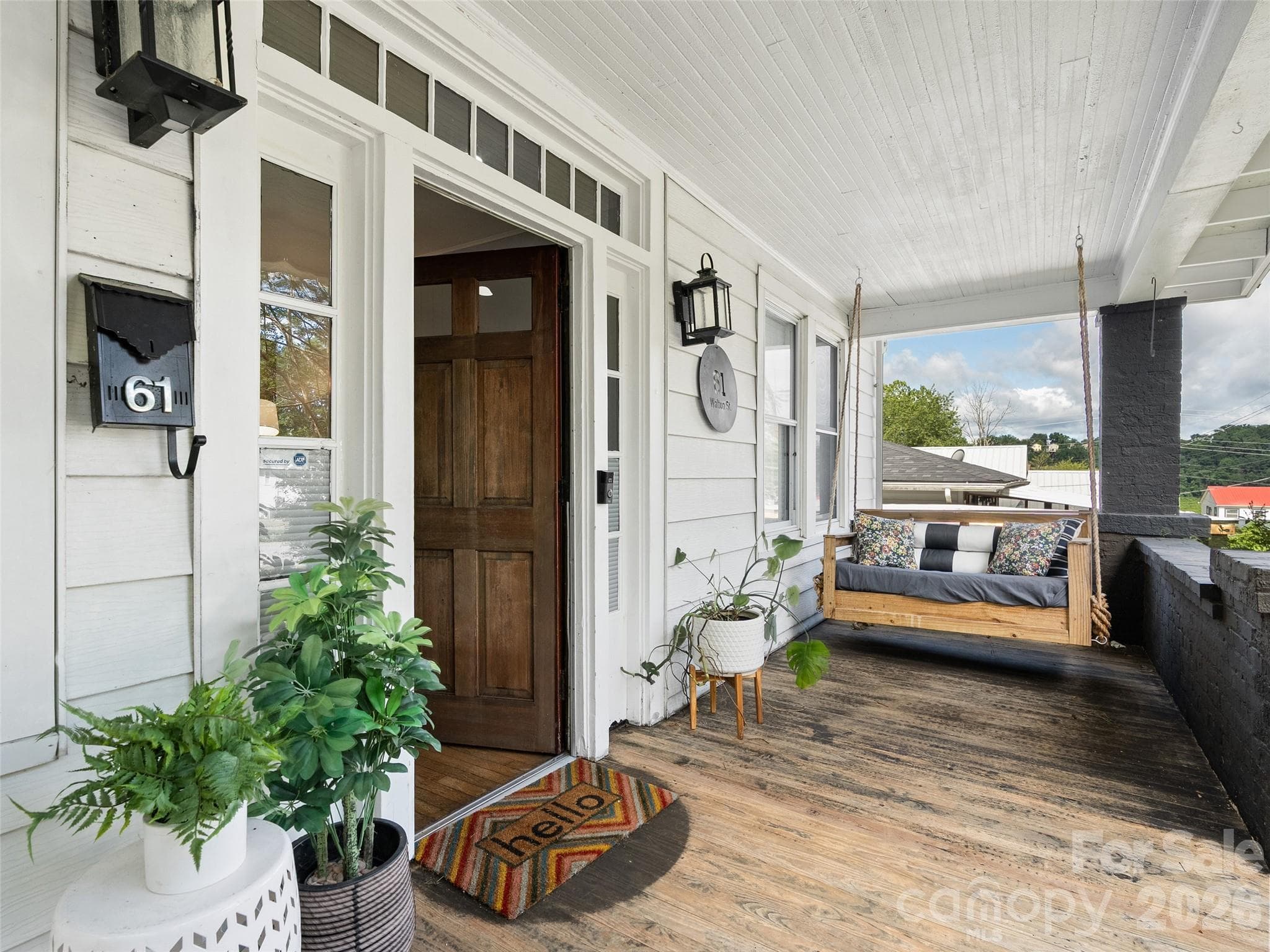 Spacious covered front porch complete with swing! - Asheville
