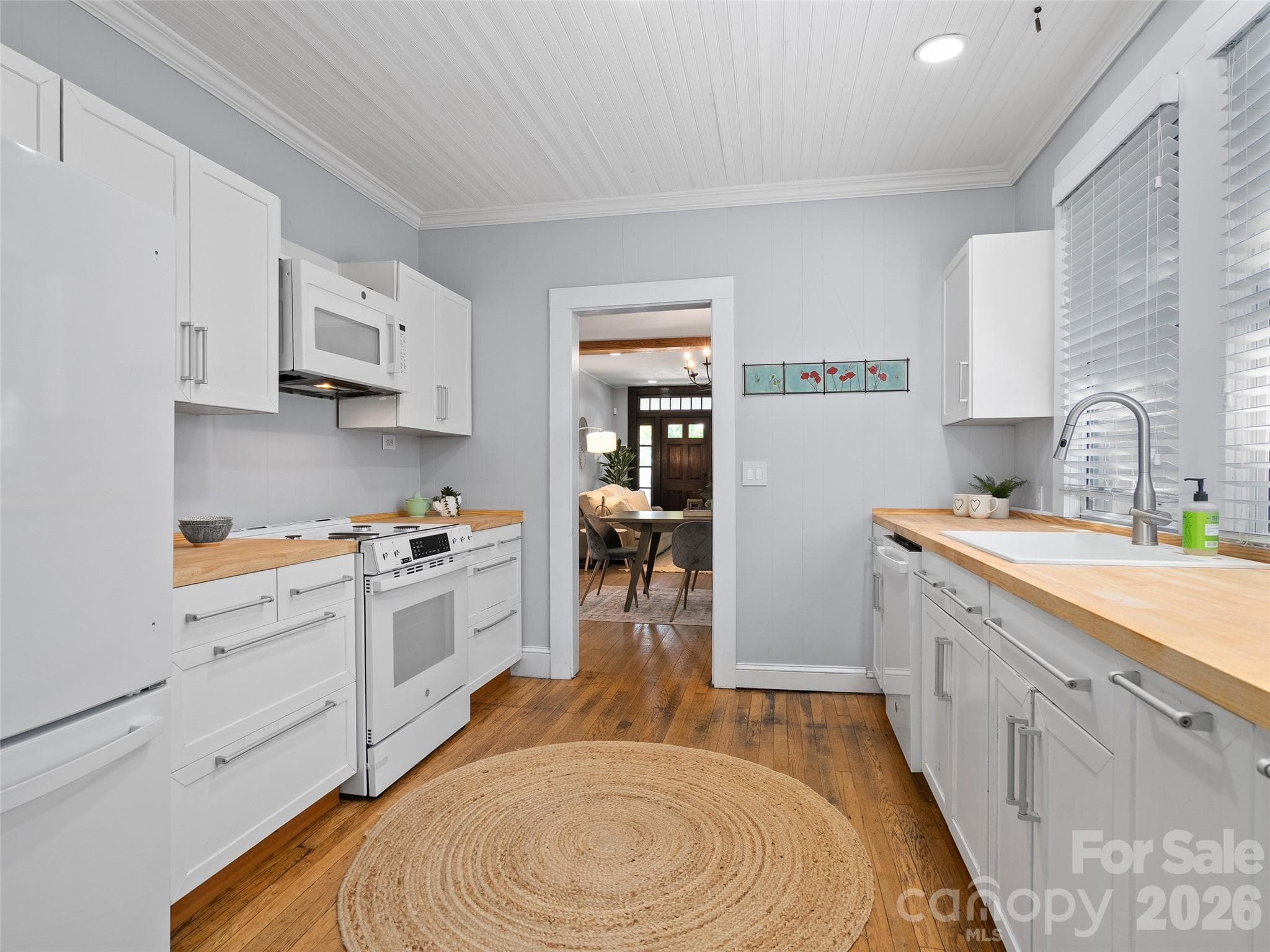 Kitchen with new appliances and butcher book countertops - Asheville