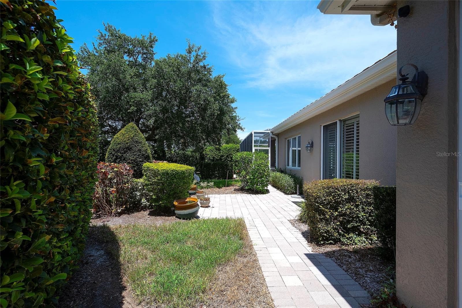 side courtyard patio - 9735 53RD DR E, BRADENTON