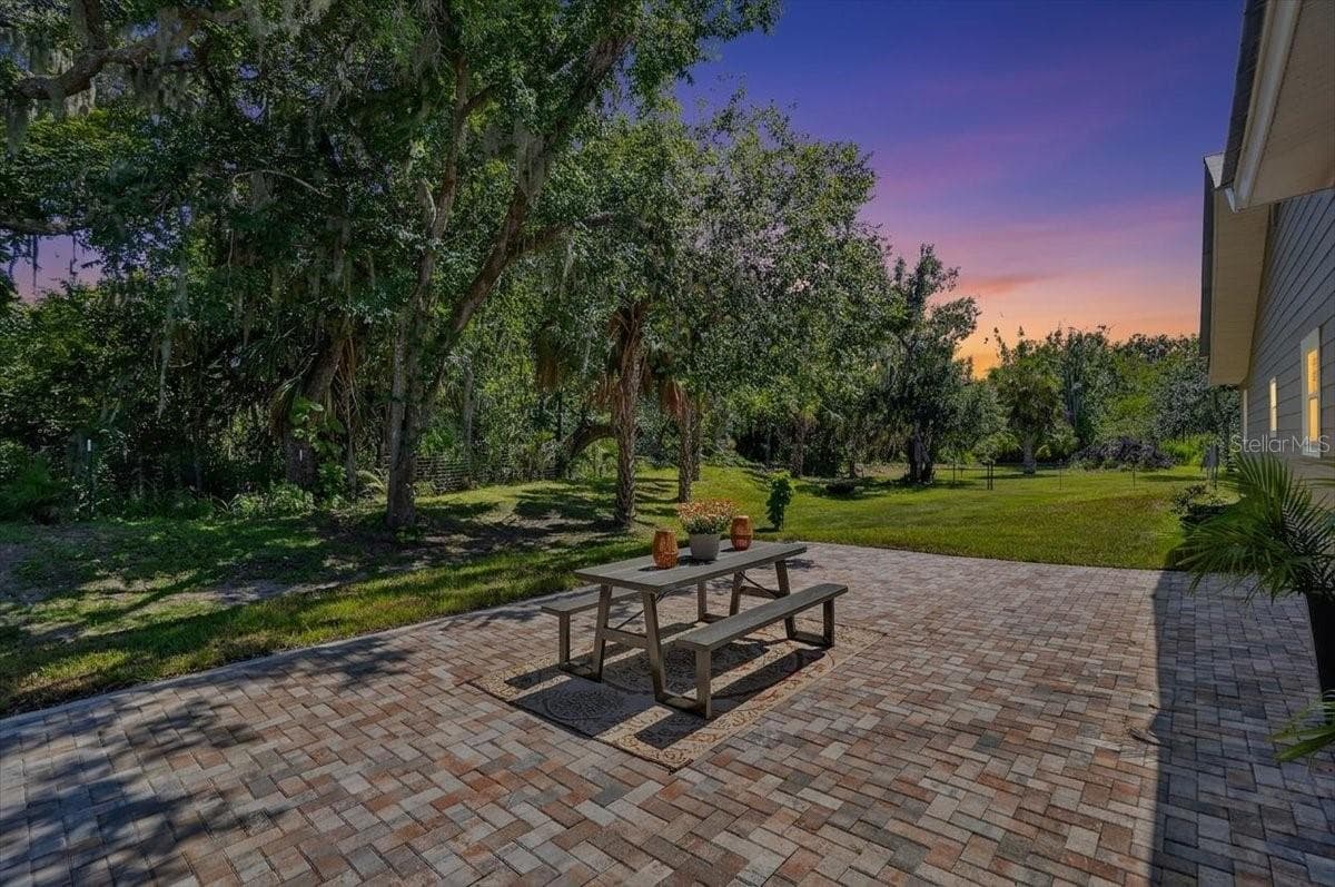 Side back yard large paver area- room for pool - 11740 DARSEY RD, PARRISH