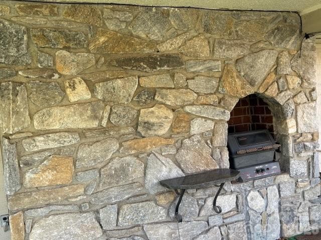 fireplace on back porch - 30 Brier Lane, Maggie Valley