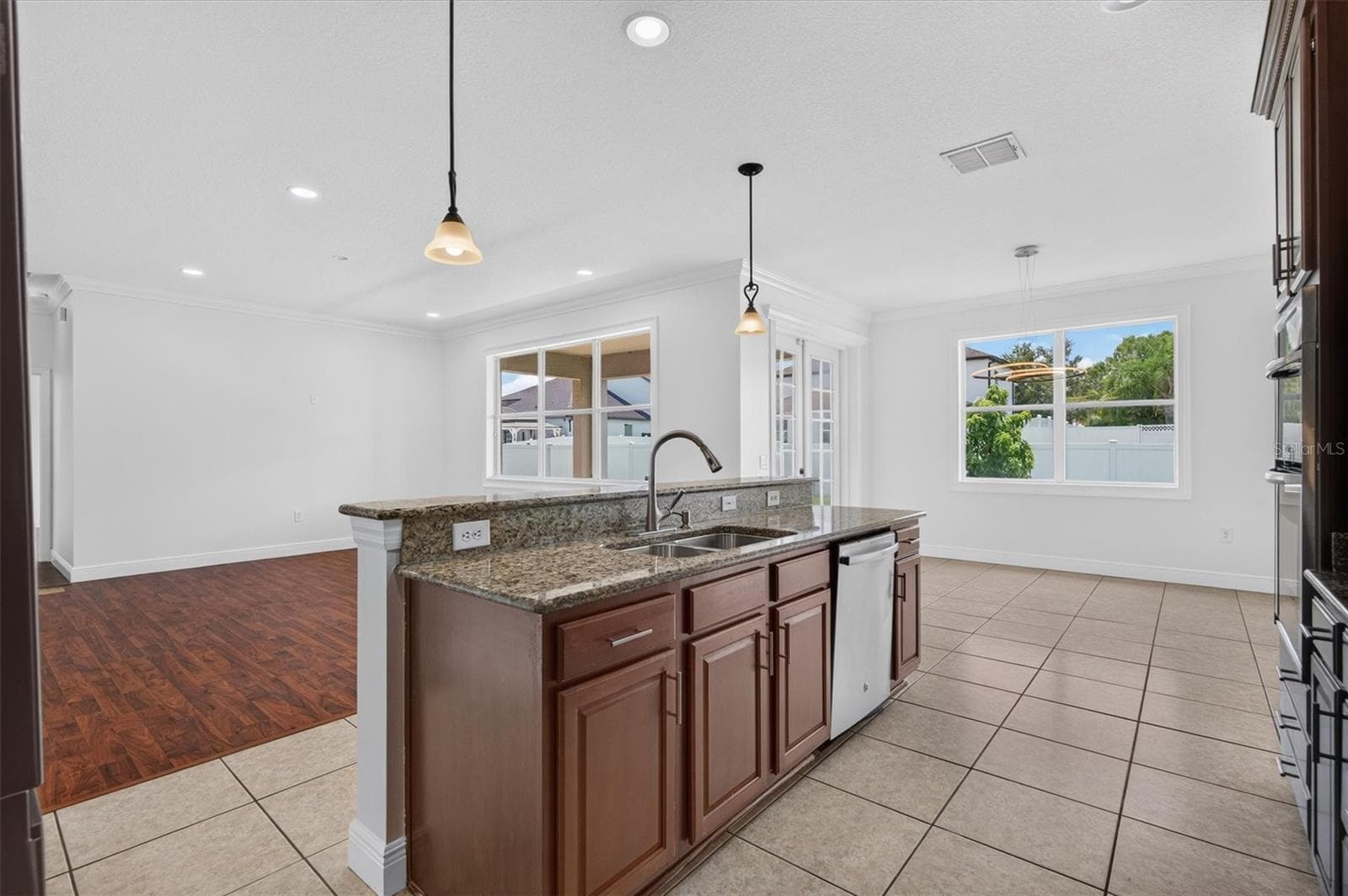 Kitchen Open to Living Space - 3922 CEDAR HAMMOCK TRL, ST CLOUD