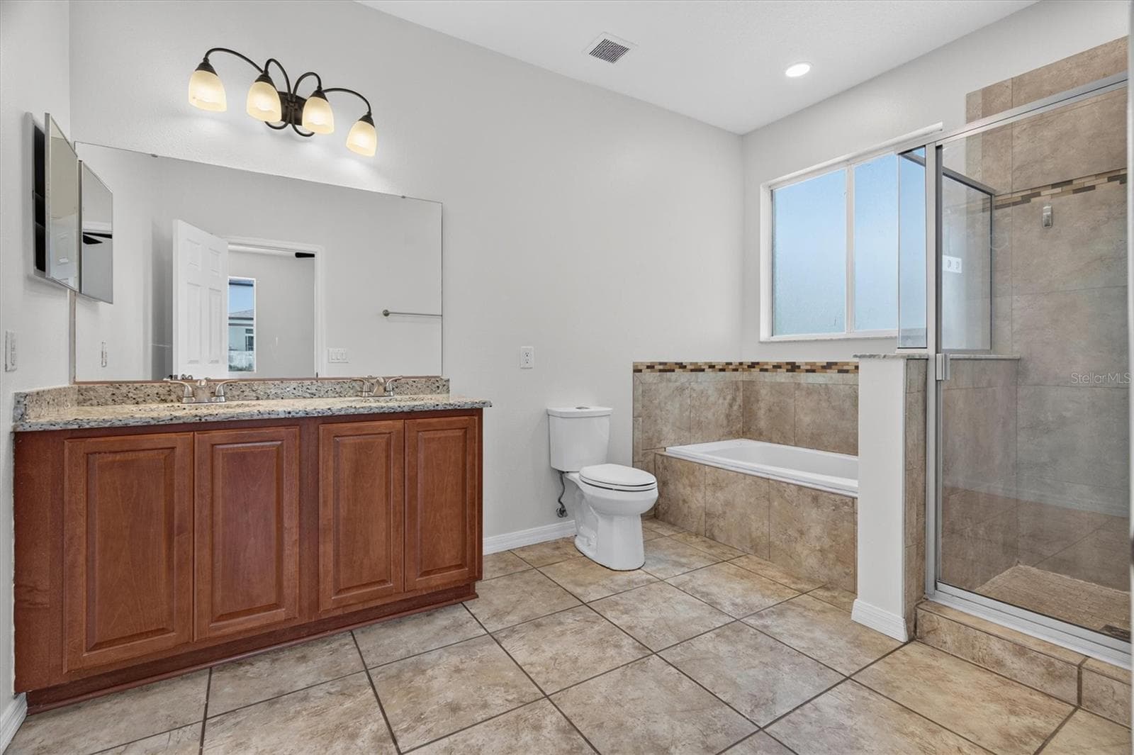 Primary En-Suite Bathroom - 3922 CEDAR HAMMOCK TRL, ST CLOUD