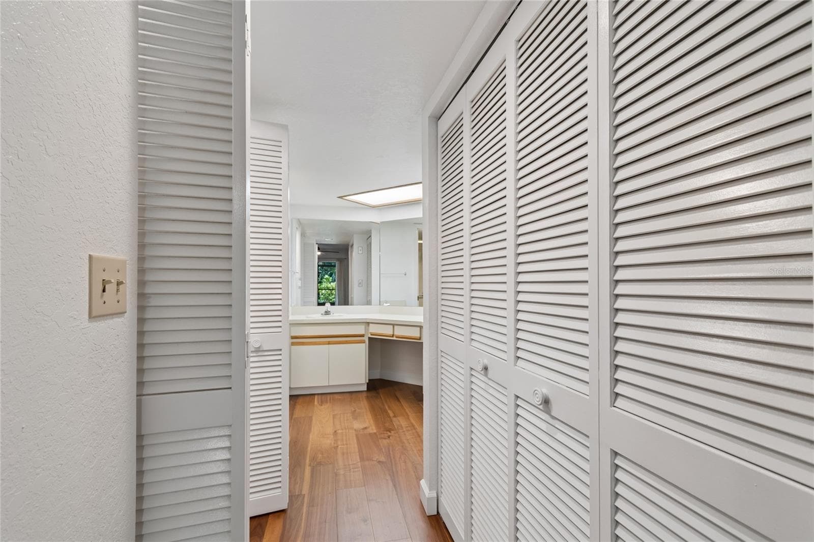 View to Primary Bathroom from Bedroom - 11800 PARK BLVD #401, SEMINOLE