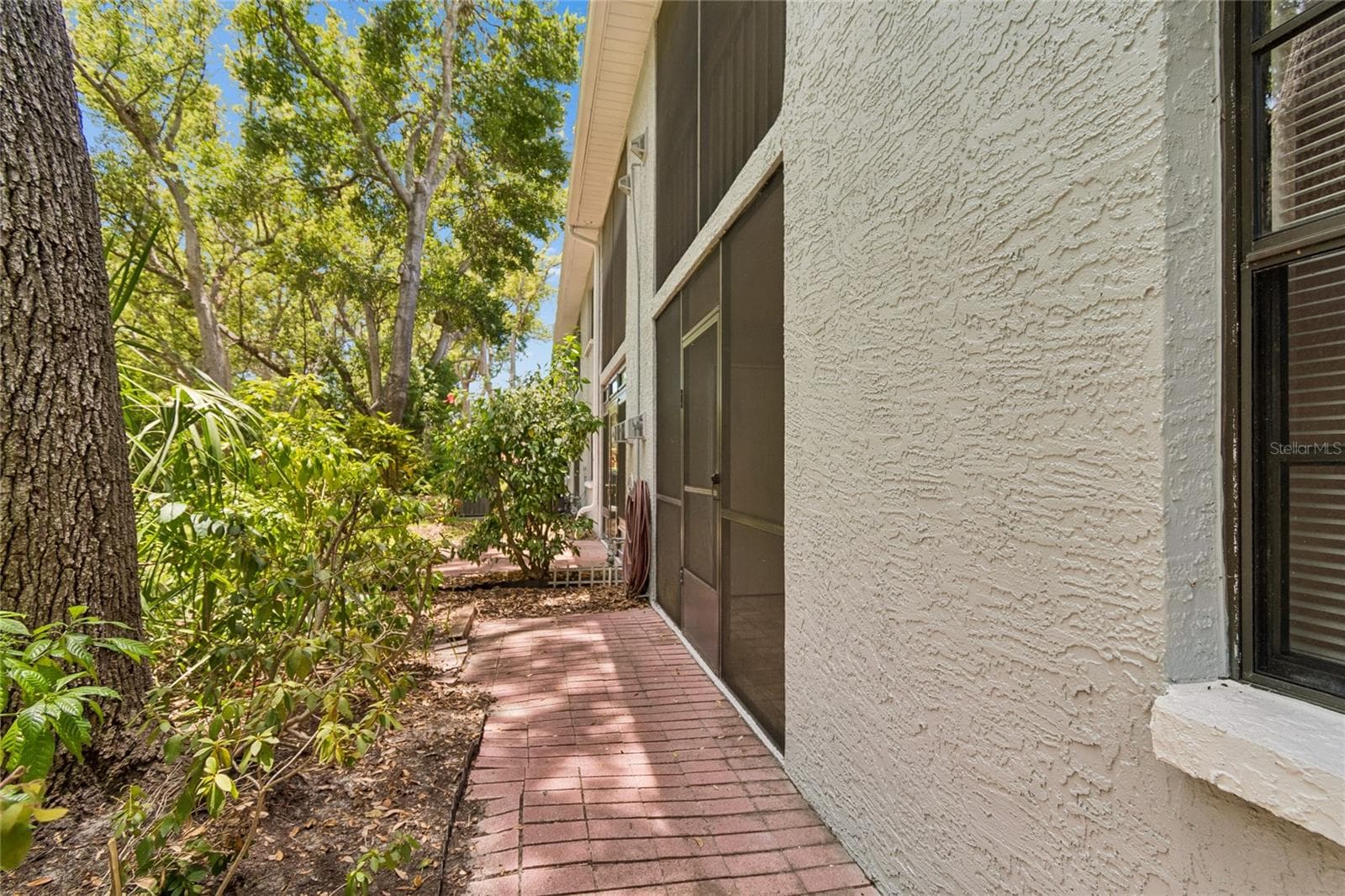 Walkway next to Screened Patio - 11800 PARK BLVD #401, SEMINOLE