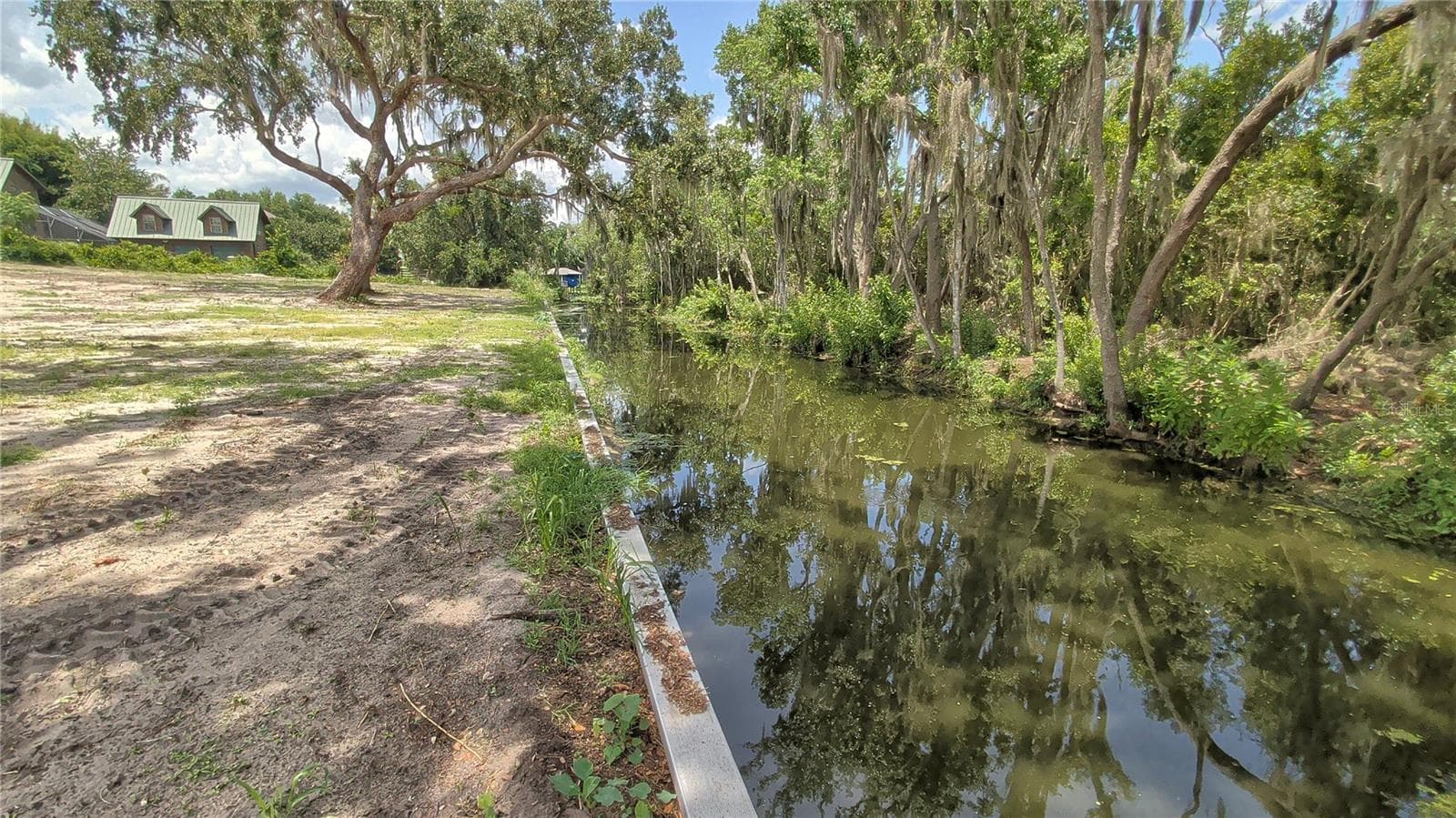 View of canal and retaining wall - SULEN RD, LADY LAKE