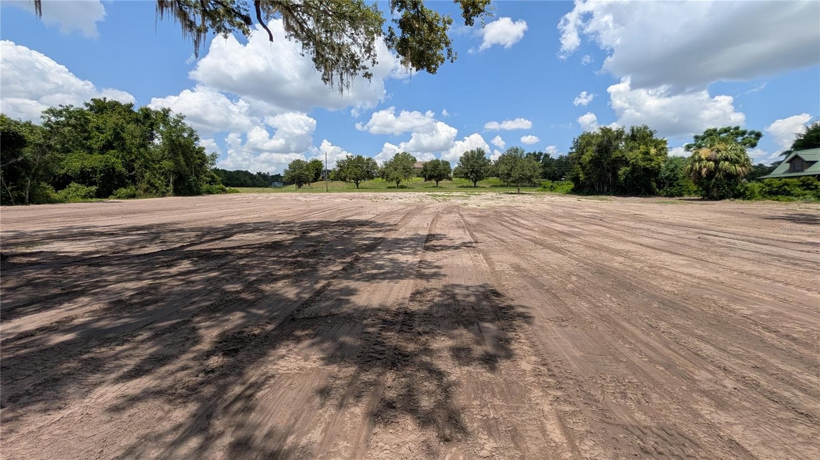 View of property from edge of canal - SULEN RD, LADY LAKE