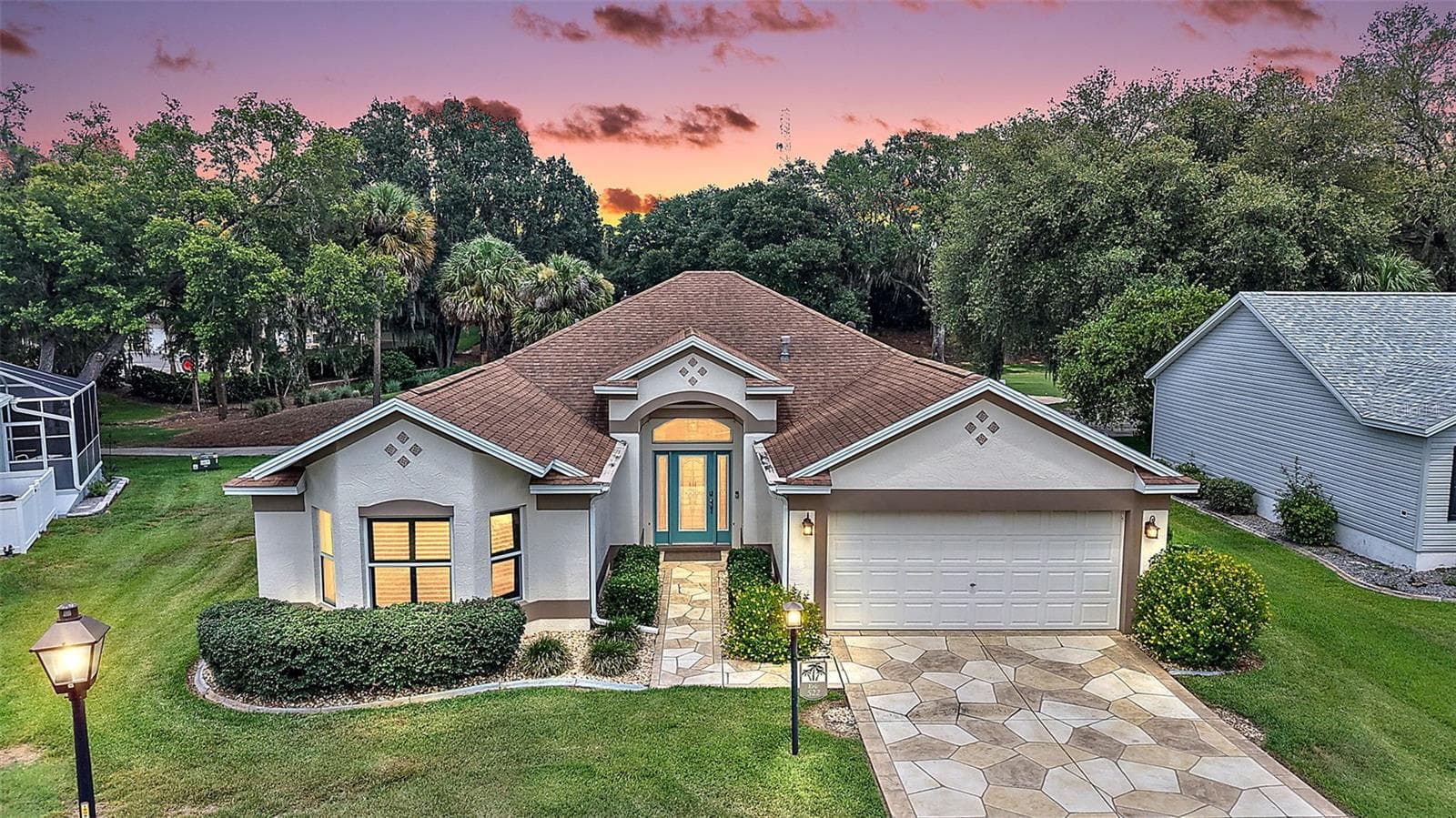Twilight Front Elevation - 522 LOMA PASEO DR, THE VILLAGES