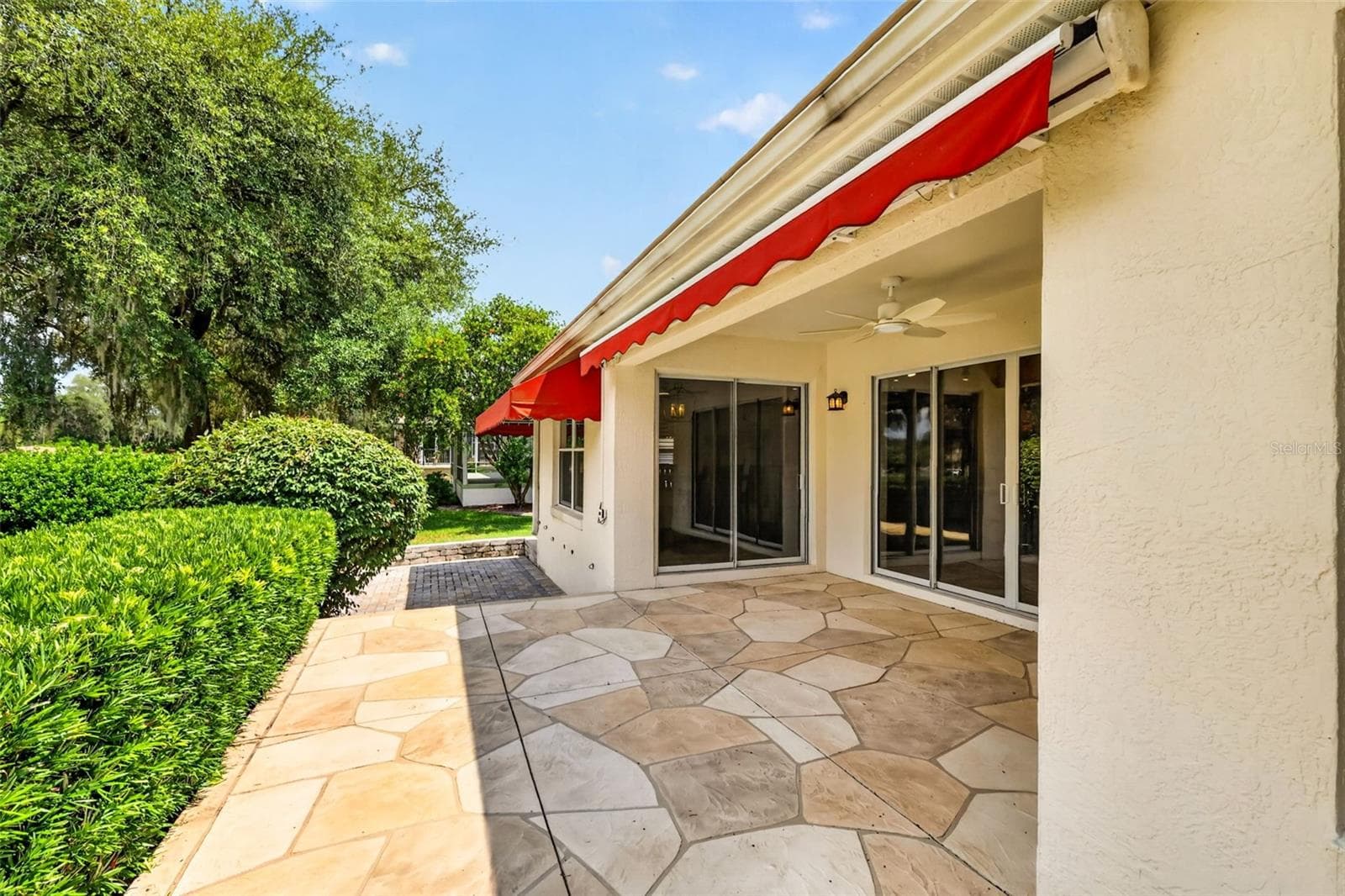 Lanai with Retractable Awning - 522 LOMA PASEO DR, THE VILLAGES