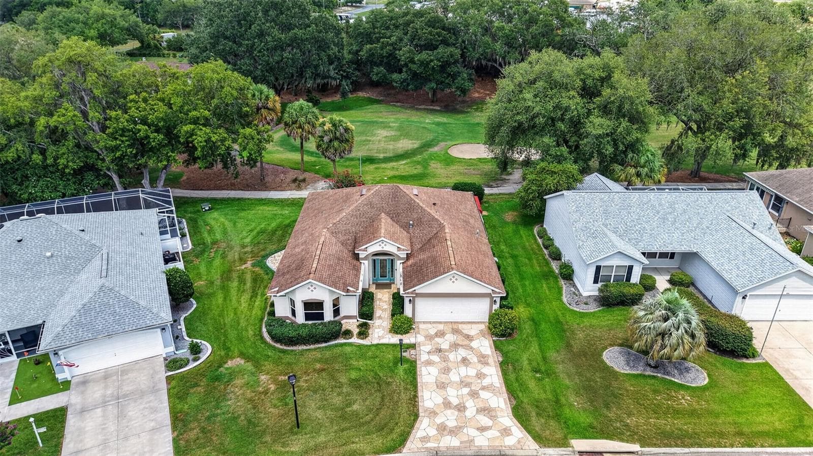 Aerial Front Elevation with Fabulous Golf Front Views! - 522 LOMA PASEO DR, THE VILLAGES
