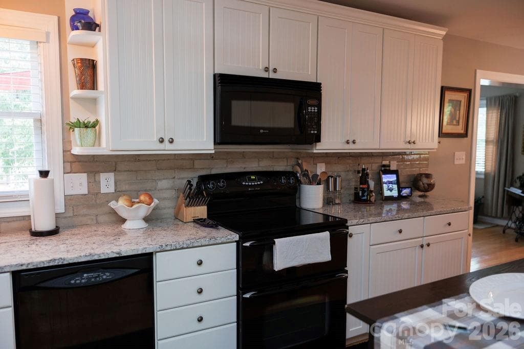 kitchen 2 with updated cabinets and backsplash - Kings Mountain