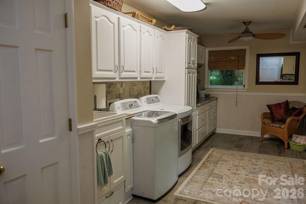Washer, dryer, and laundry sink with a laundry shoot - Kings Mountain
