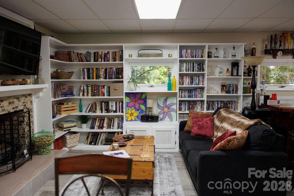 Recreational room with built in shelves - Kings Mountain