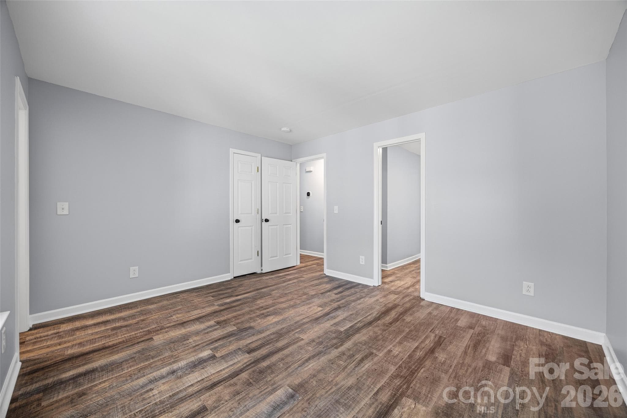Primary Bedroom with access to the bathroom - 8119 Tremaine Court, Charlotte