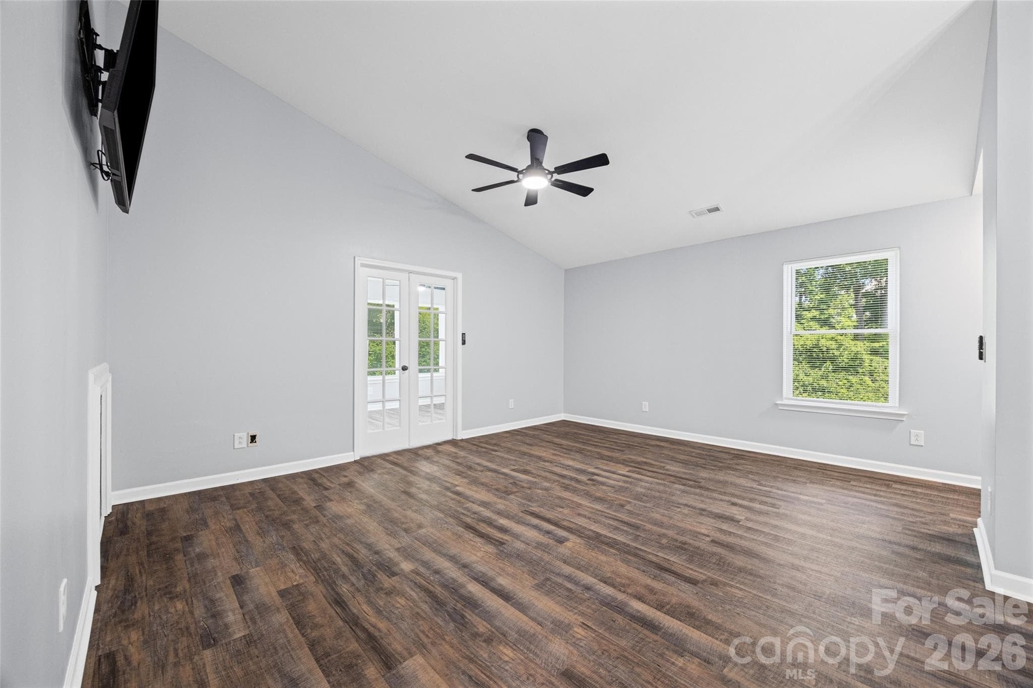 Large Living Room with new ceiling fan - 8119 Tremaine Court, Charlotte