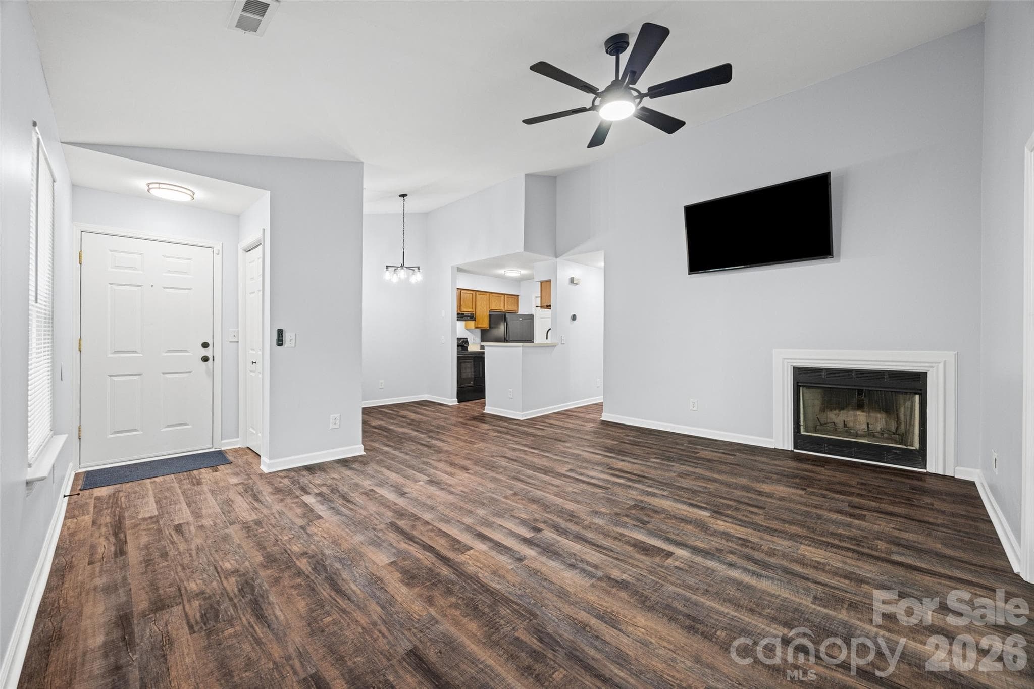 Large Living Room showcases the open floor plan - 8119 Tremaine Court, Charlotte