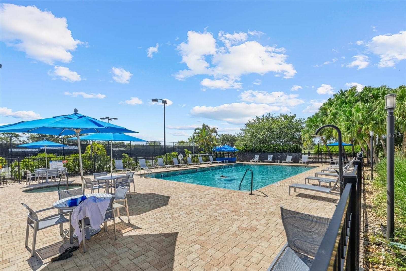 UMBRELLA TABLES & LOUNGERS AT CLUB POOL - 9550 HIGH GATE DR #1525, SARASOTA