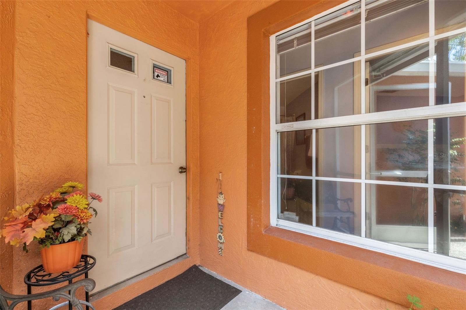Front Door Entry in Screened Lanai - 907 50TH ST E, BRADENTON