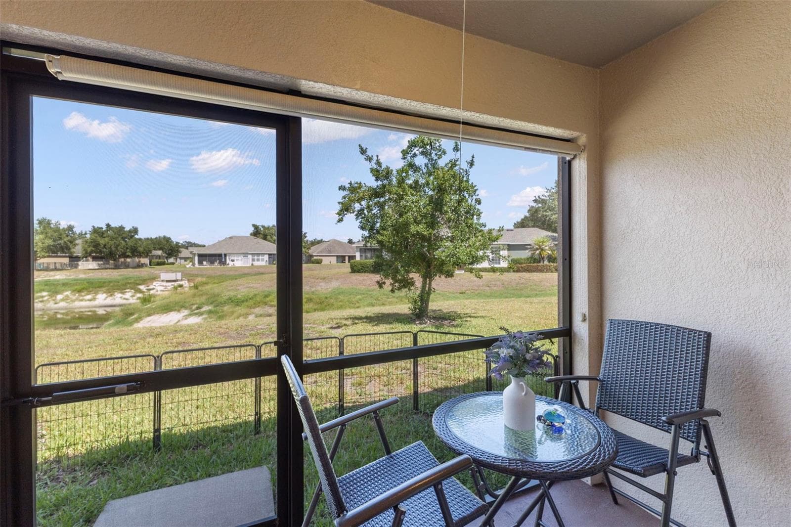 Rear porch - 13627 CREST LAKE DR, HUDSON