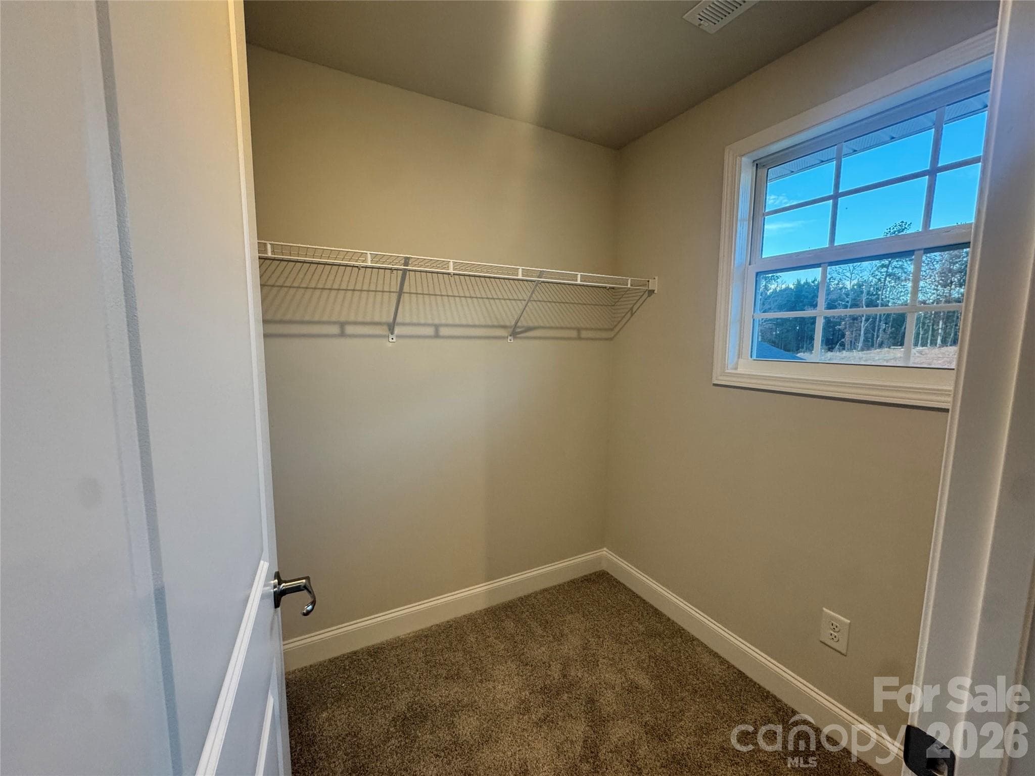 Bedroom 2 walk-in closet Representative Photo - 712 Inwood Hill Drive, Gastonia