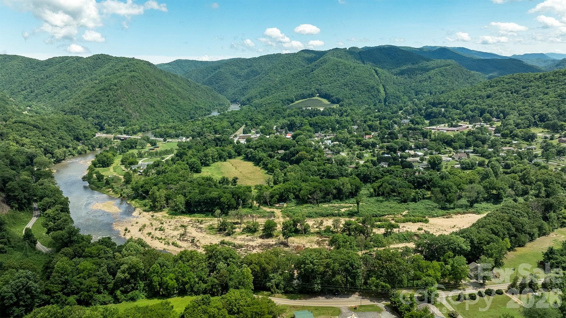 Property is just above the French Broad River - 821 River Road, Hot Springs