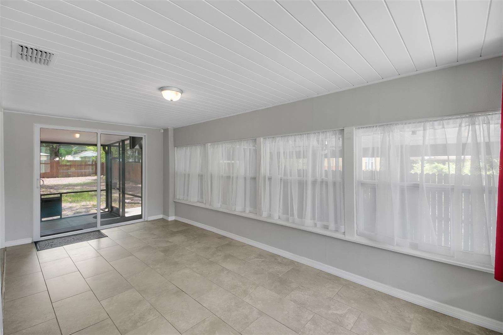 Large Room - Possibly Dining Room - Exits to Rear Screened Patio - 301 S HAMPTON AVE, ORLANDO