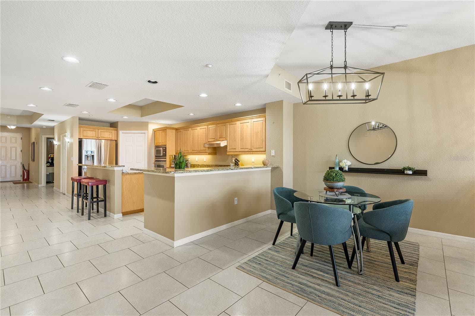 Open Living, Dining, and Kitchen the Heart of the Home - 3805 GULF BLVD #203, ST PETE BEACH