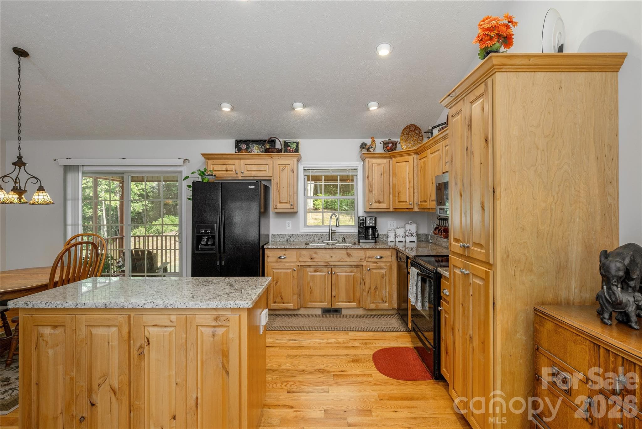 Spacious Kitchen, Island with granite countertops - Brevard