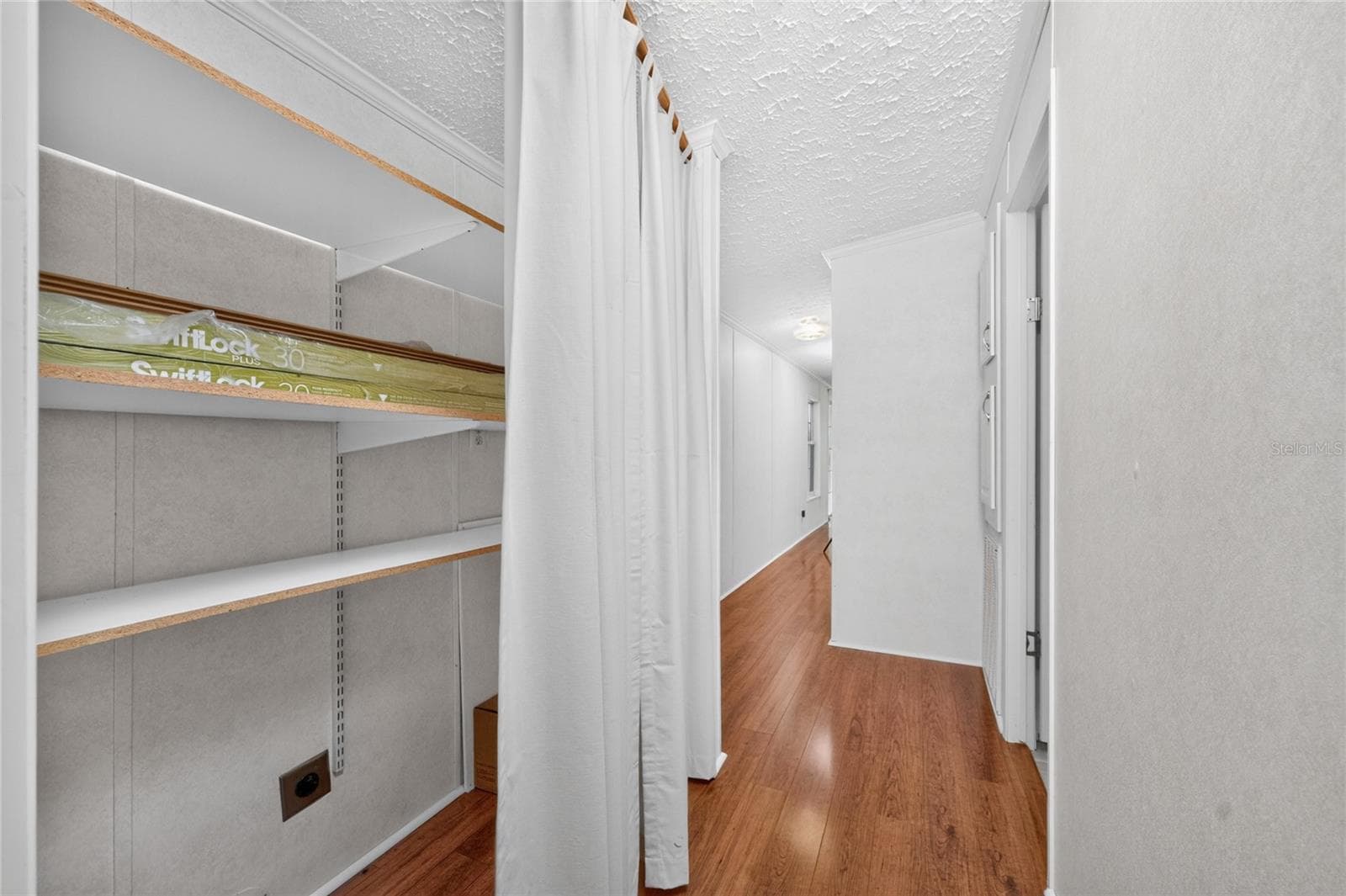Hallway closet - 10 HOLLAND DR, PUNTA GORDA