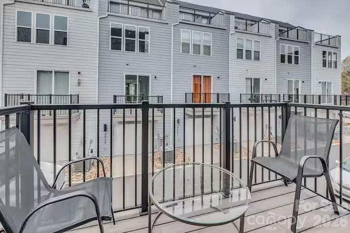 Step outside to a private balcony, the perfect spot to enjoy your morning coffee, unwind in the evening, or take in the surrounding neighborhood views." - 3019 Jolene Court, Charlotte
