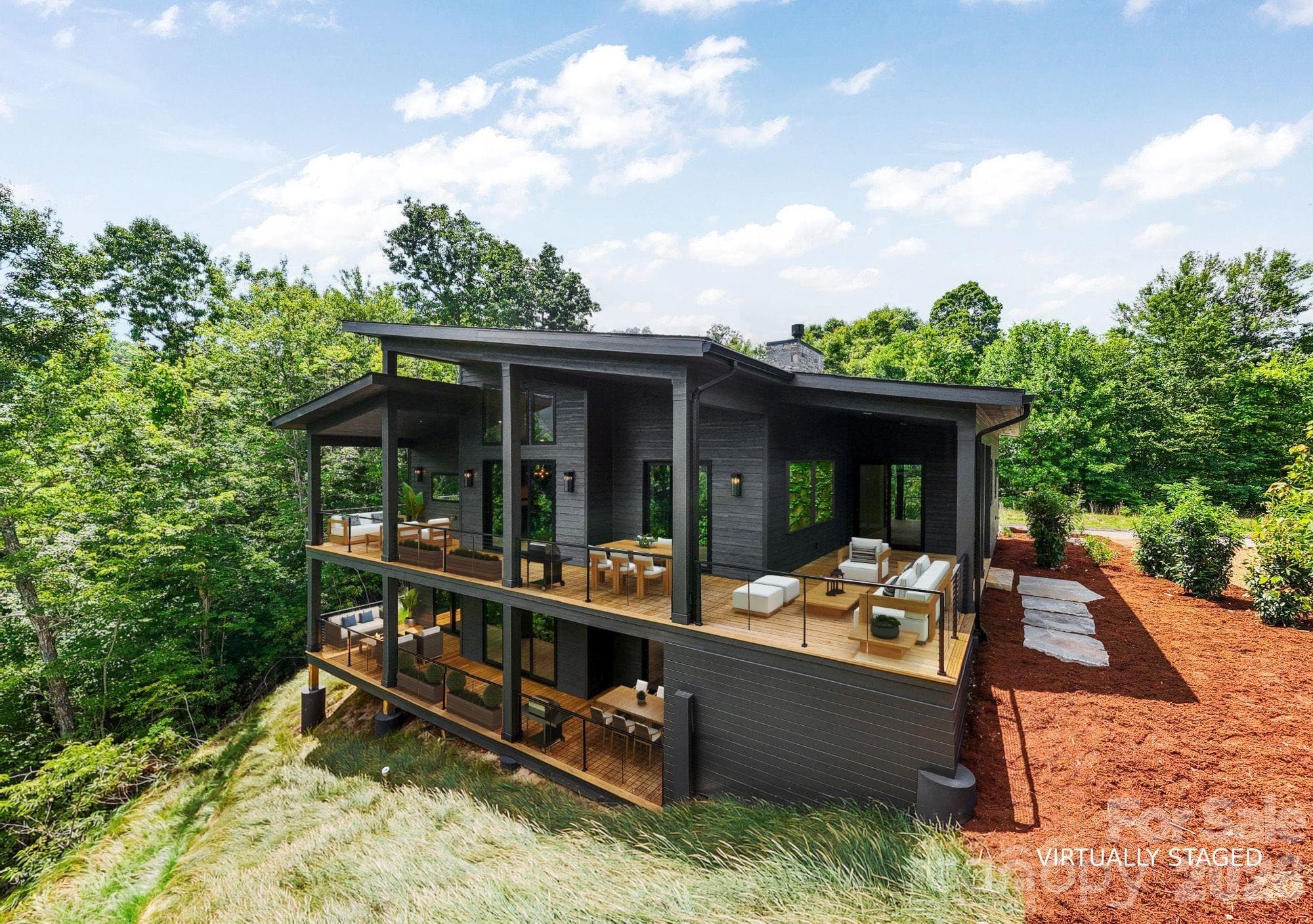 Rear of home virtually staged. - Waynesville