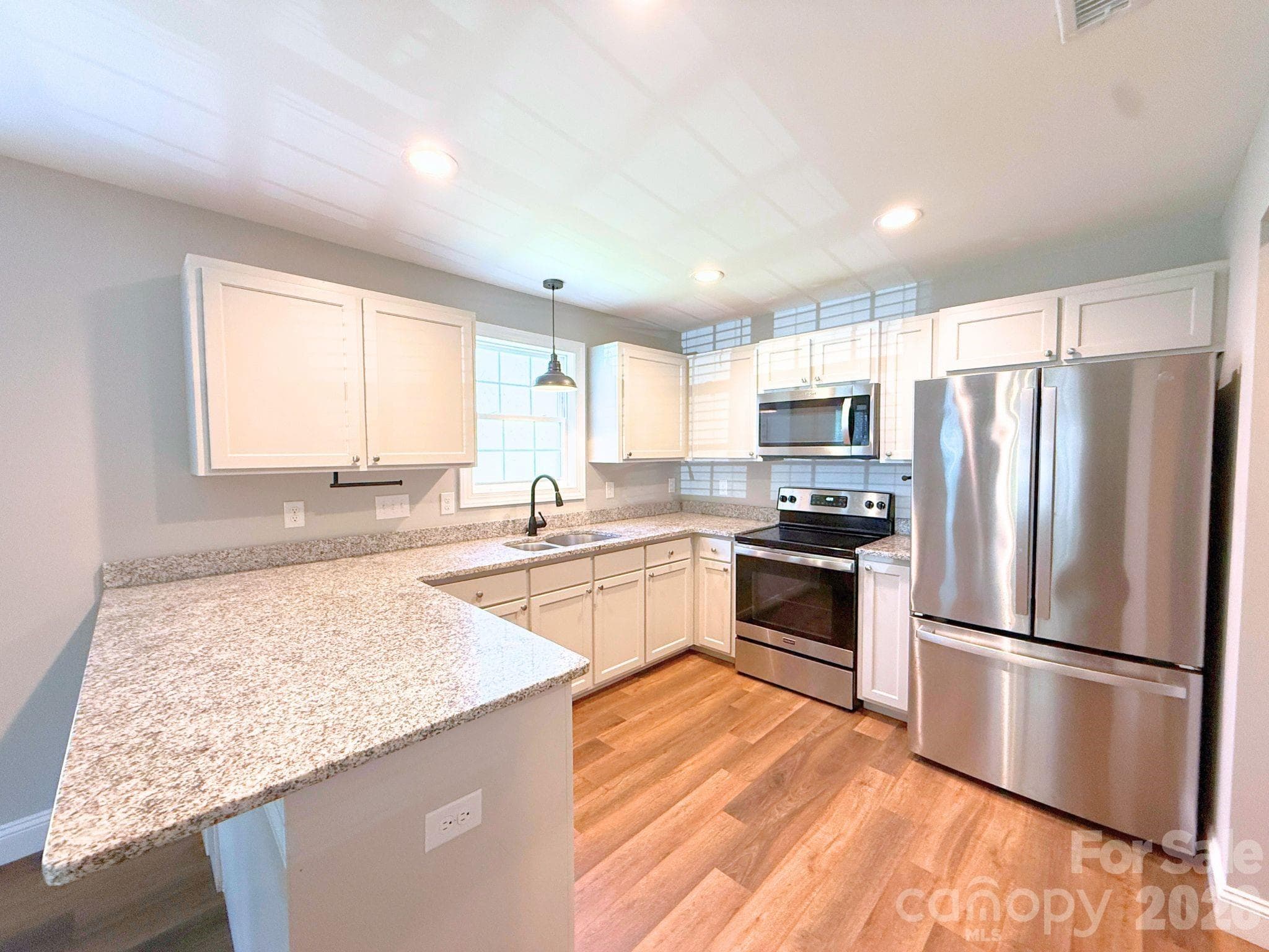 Kitchen – Well-appointed kitchen offering generous counter space, stainless steel appliances, and a bright, open layout designed for convenience. - Chester