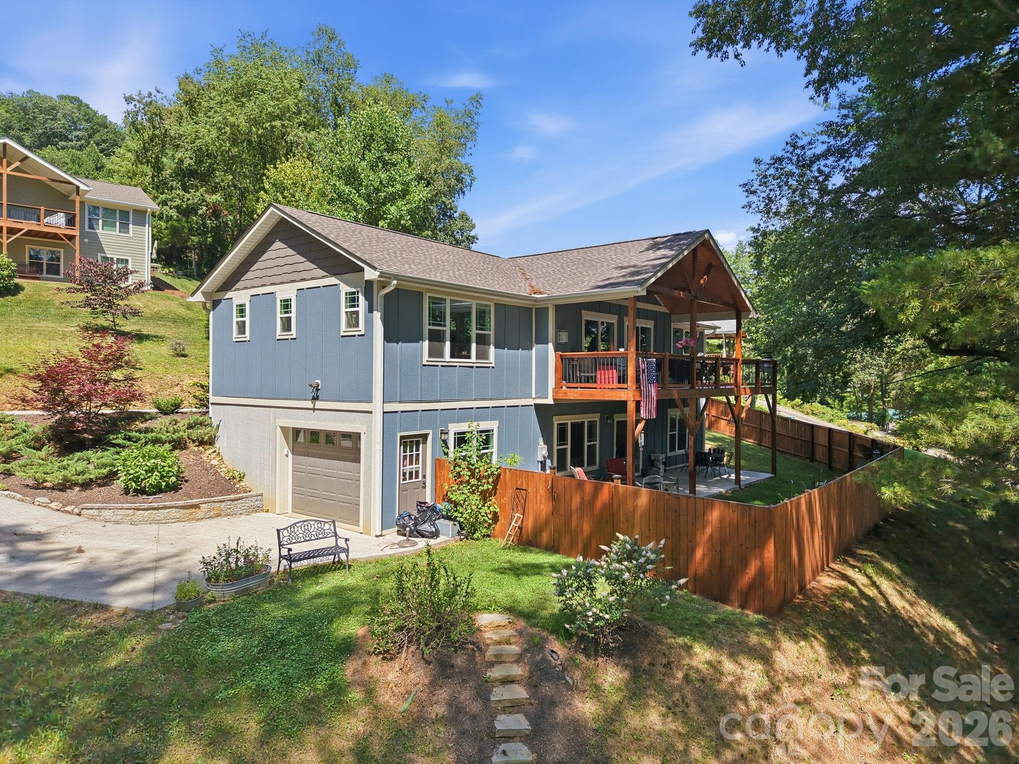 Side view of House with back yard and fence - Waynesville