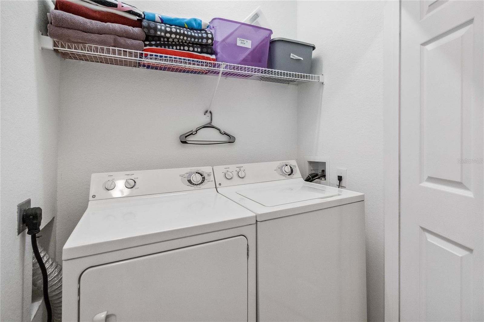 Laundry closet with new washer and dryer. - 2821 E ALMATON LOOP #401, KISSIMMEE