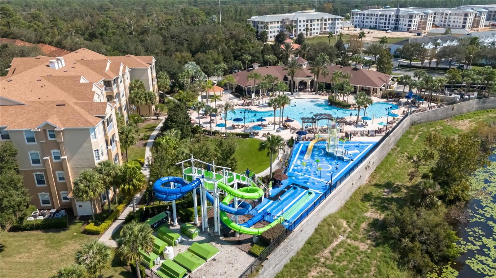 Aerial view of Pool area. - 2821 E ALMATON LOOP #401, KISSIMMEE