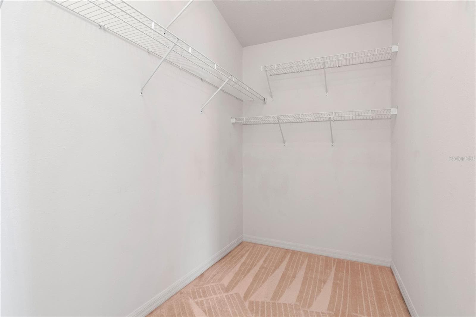 Primary Bedroom Walk-In Closet - 10029 BROOKDALE DR, NEW PORT RICHEY