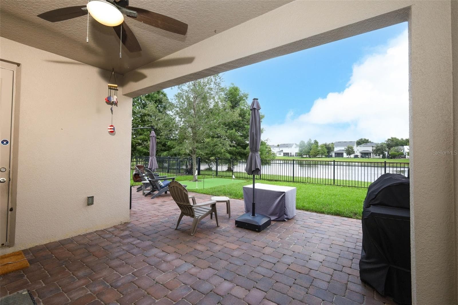 Patio and backyard - 3980 LIGHTNING CT, SANFORD