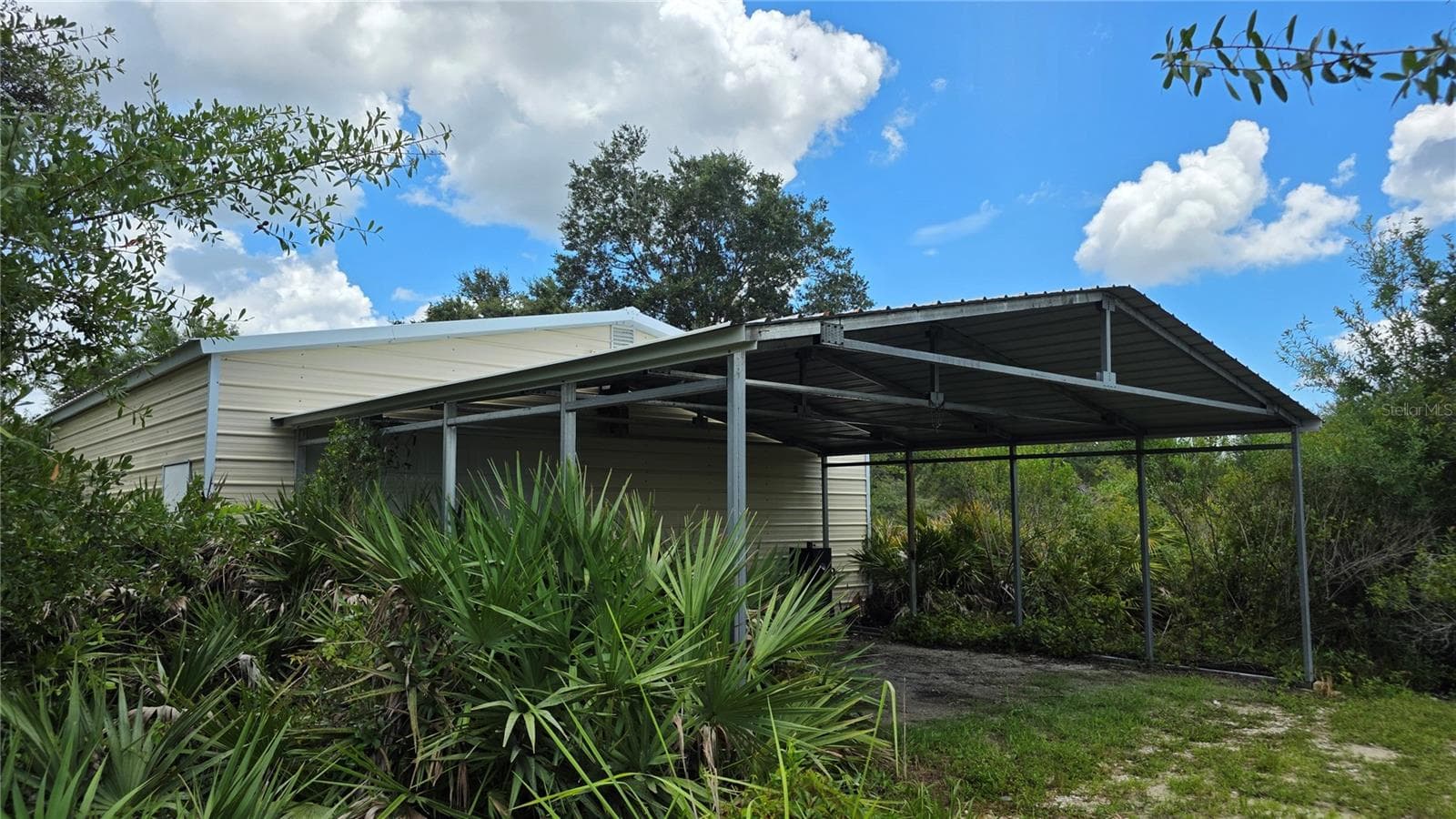 Workshop- Perfect for a home business, hobby space, she shed, or man cave. - 1210 408TH CT E, MYAKKA CITY