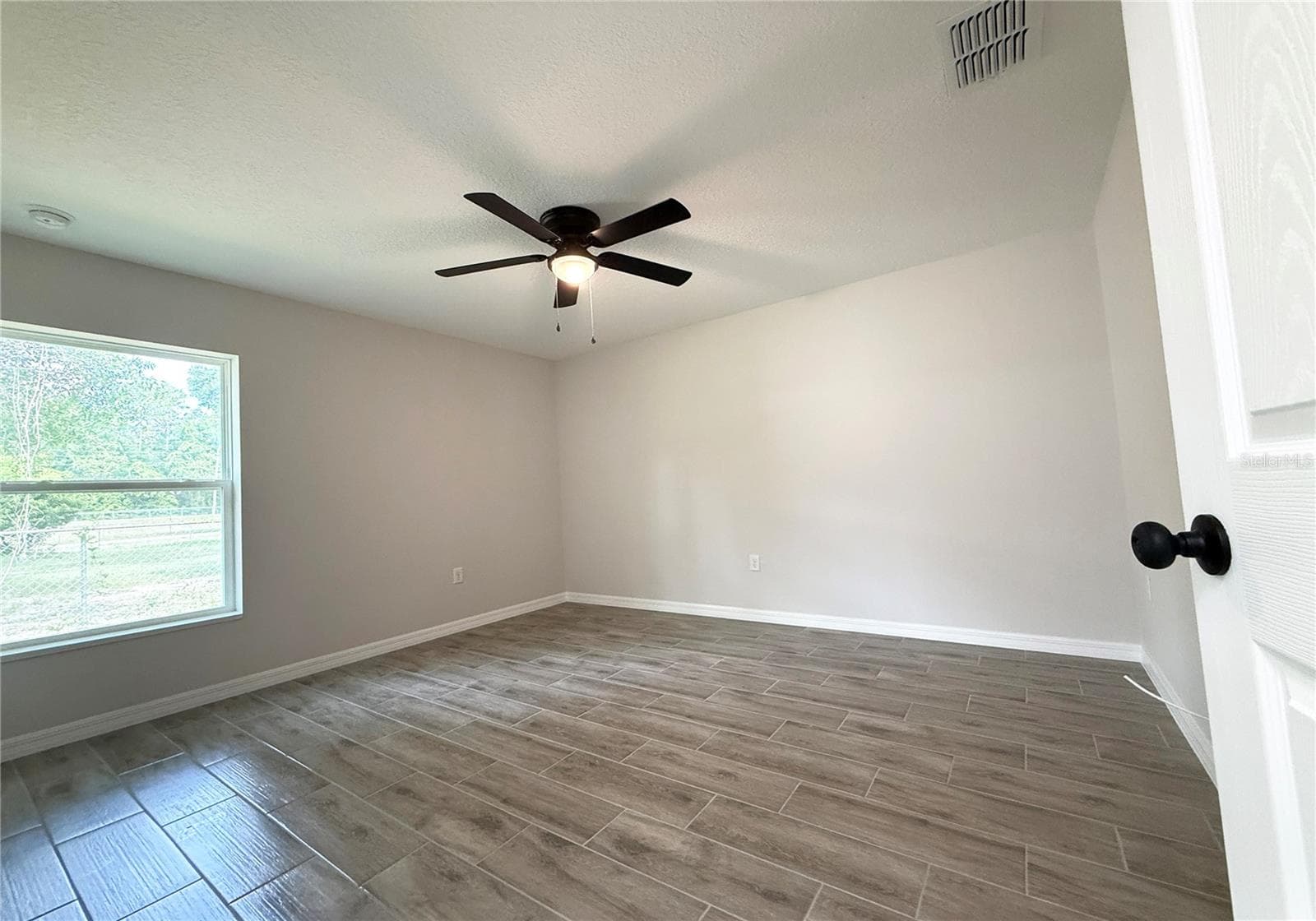 master bedroom - 5687 NW 57TH ST, OCALA